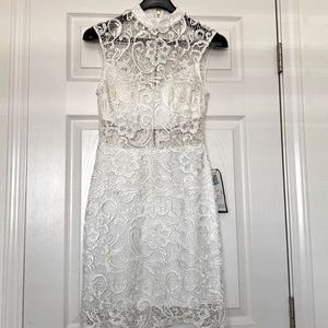 B. Darlin White Sleeveless Lace A-Line Bare Midriff Dress; Engagement dress